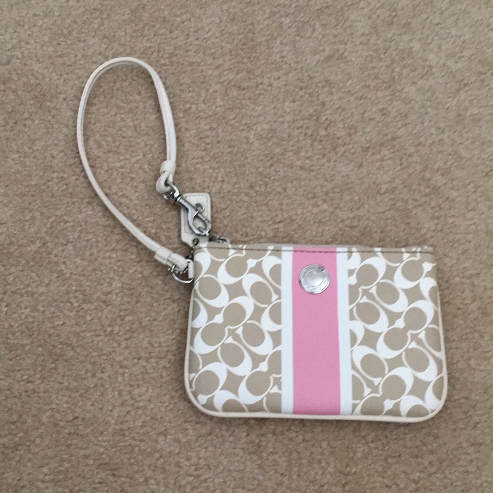 Beige and pink coach wristlet